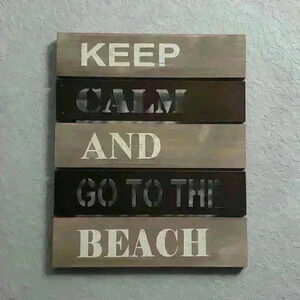Metal and wood sign